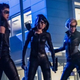 From left to right: Black Canary (Juliana Harkavy), Green Arrow (Katherine McNamara), and Black Canary (Katie Cassidy) in the Arrow spinoff pilot.